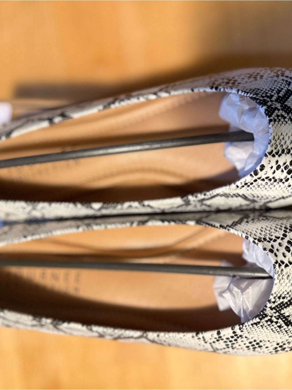 Journee Collection Snake-Print Flats in White and Black